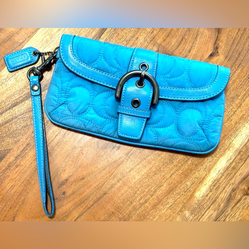 Quilted Coach wristlet. Baby blue. Good used condition.
